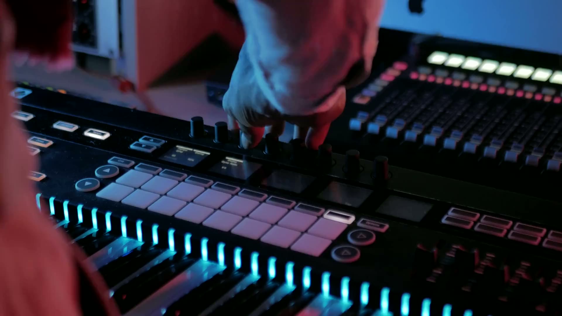Faders and dials on an audio mixing desk